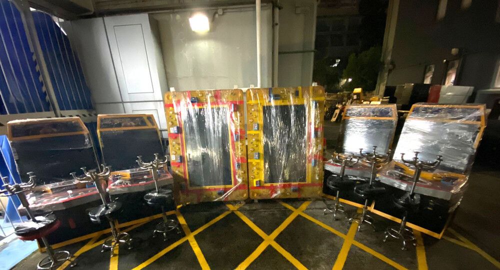 Police raid gambling den and vice establishment in Yuen Long; arrest eight