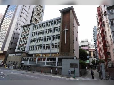 Ex-Hong Kong school head charged with misconduct over alleged tutor centre link