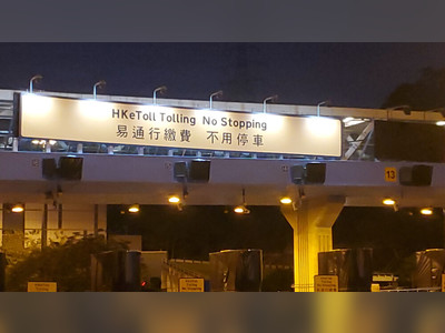 Hesitation and confusion on drivers' faces on first day of HKeToll implementation