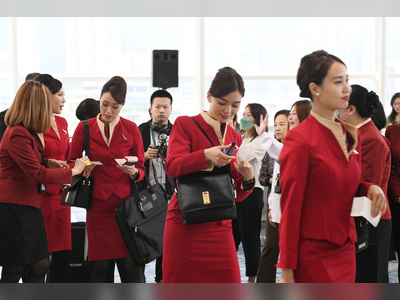 Cathay Pacific Flight Attendants Union Defends Staff, Encourages Passengers to Respect Privacy