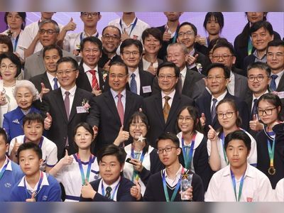 Hong Kong officials can tell city’s story overseas, combat lies, John Lee says