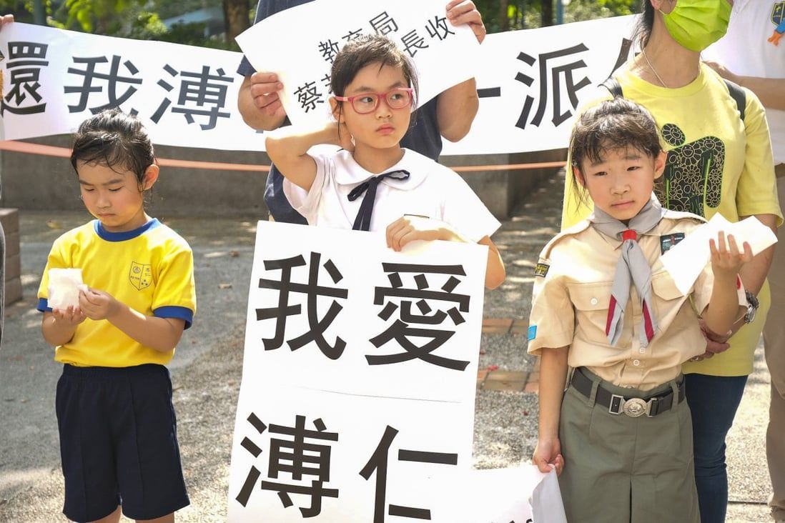 Hong Kong education chief declines to meet parents seeking reprieve for school