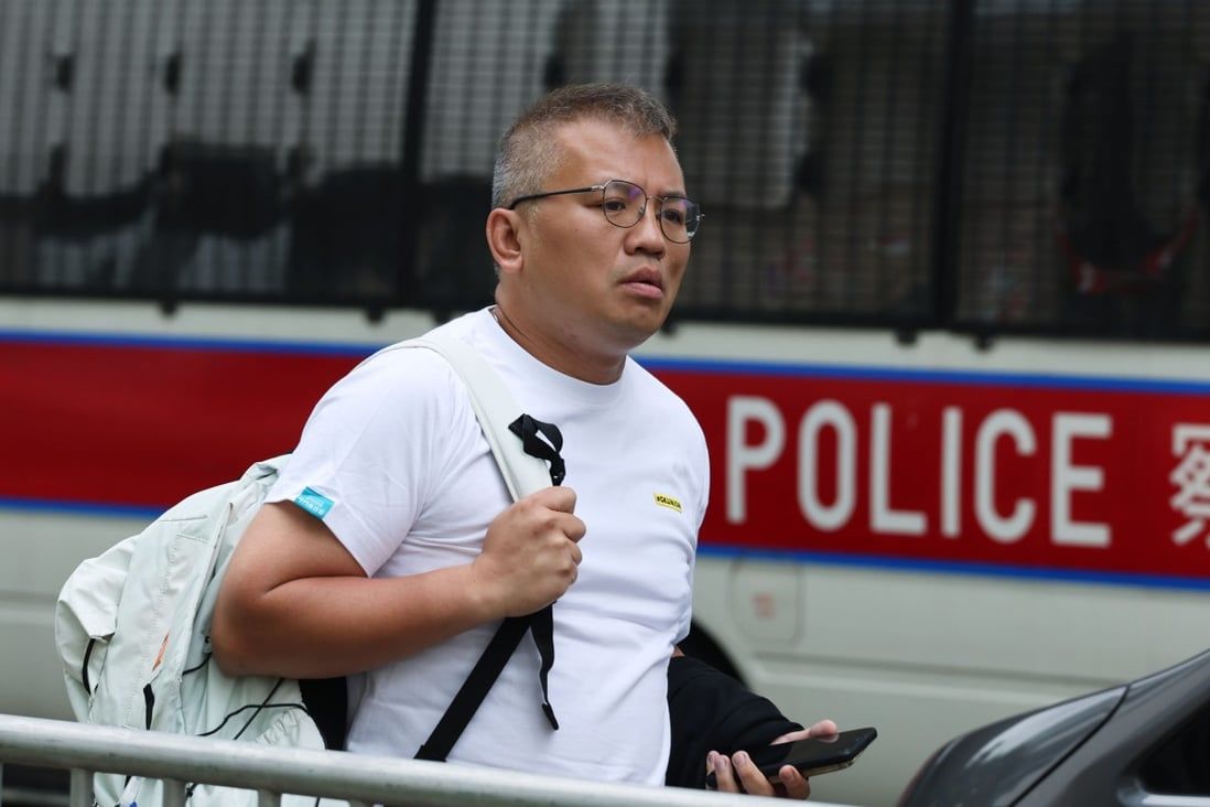 Hong Kong officer denies exaggerating evidence in trial of journalist union head