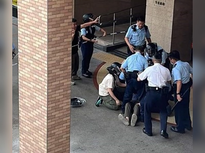 On Saturday morning, police received reports of a man wielding two knives in Mei Foo Sun Chuen, a housing estate in Hong Kong